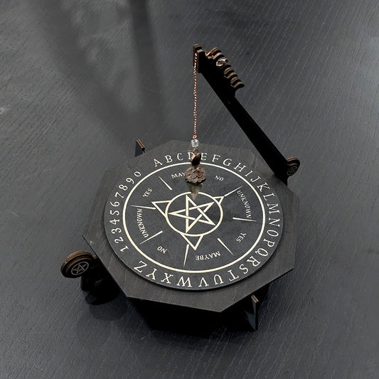Unique engraved pendulum board in black wood. 